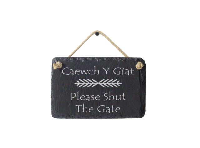 Slate shed sign engraved with the Welsh words for Dads Shed 